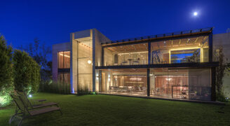 Large glazed sliding facades to luxury new build home in Mexico